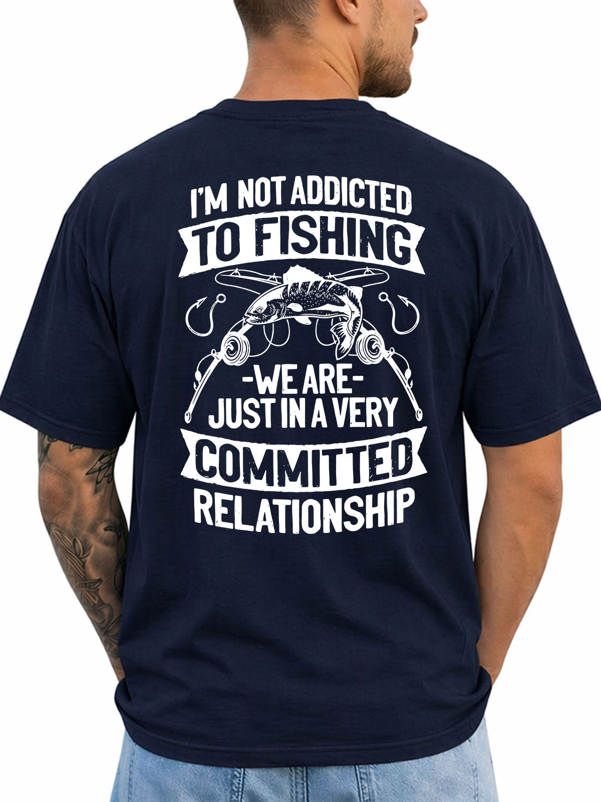 Navy T-shirt back with fish, rods, hooks, and committed-relationship fishing joke