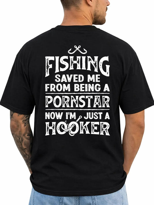 A man shown from the back wearing a black t-shirt with a humorous white graphic text print that reads 'FISHING SAVED ME FROM BEING A PORNSTAR NOW I'M JUST A HOOKER' with a fishing line and hook design.