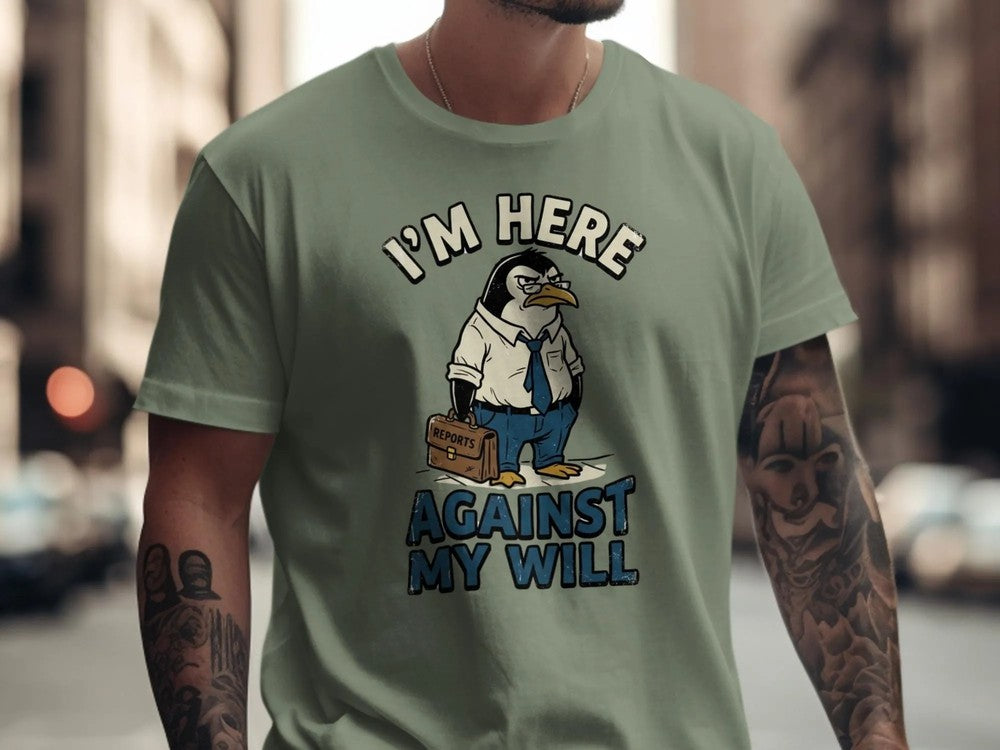 I'm Here Against My Will Penguin Shirt | Funny Office Humor Tee | Grumpy Anti-Work Sarcastic Gift