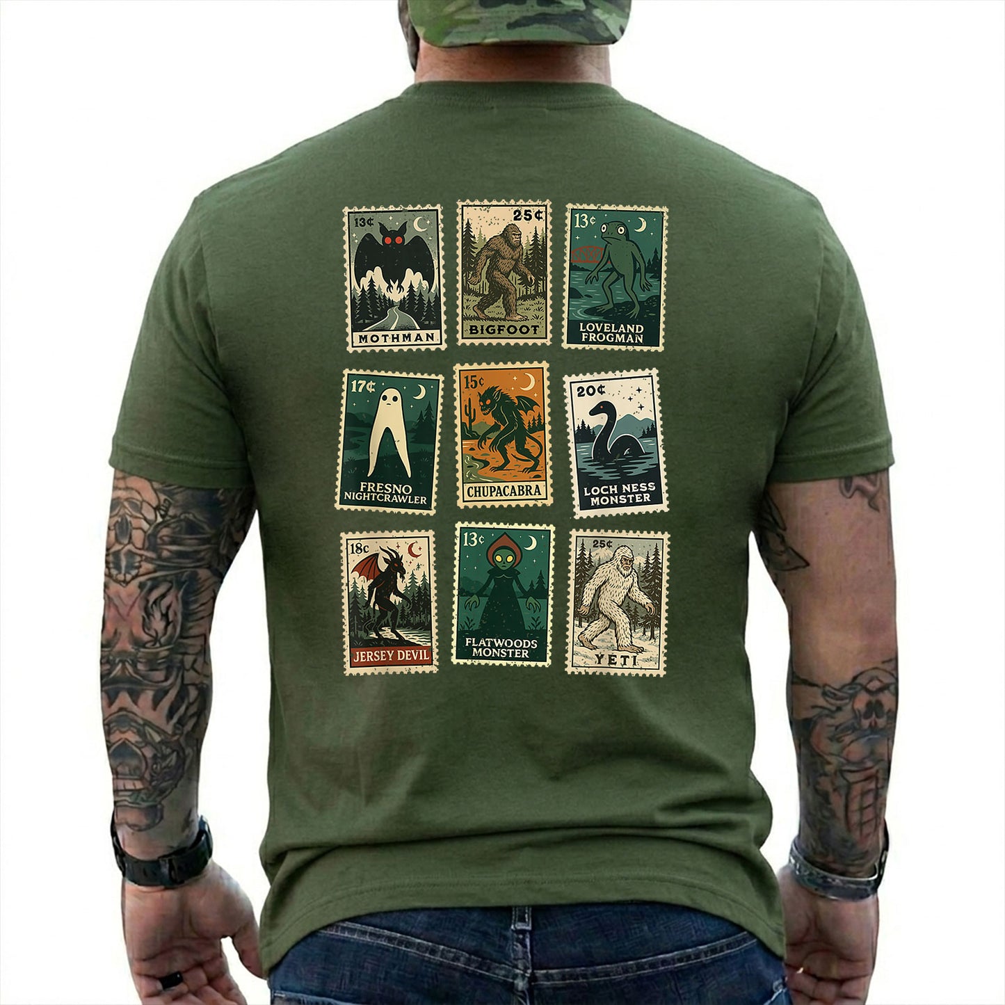 Military Green T-shirt back with nine vintage-style cryptid stamps featuring Mothman, Bigfoot, and other legendary creatures