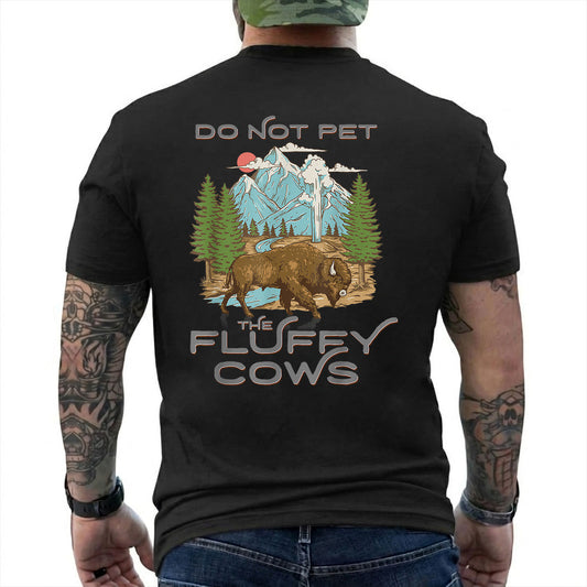 Do Not Pet Fluffy Cows Yellowstone Bison T-Shirt artwork detail with retro bison, mountain, forest, and geyser scene with Do Not Pet The Fluffy Cows text reading 'DO NOT PET THE FLUFFY COWS'