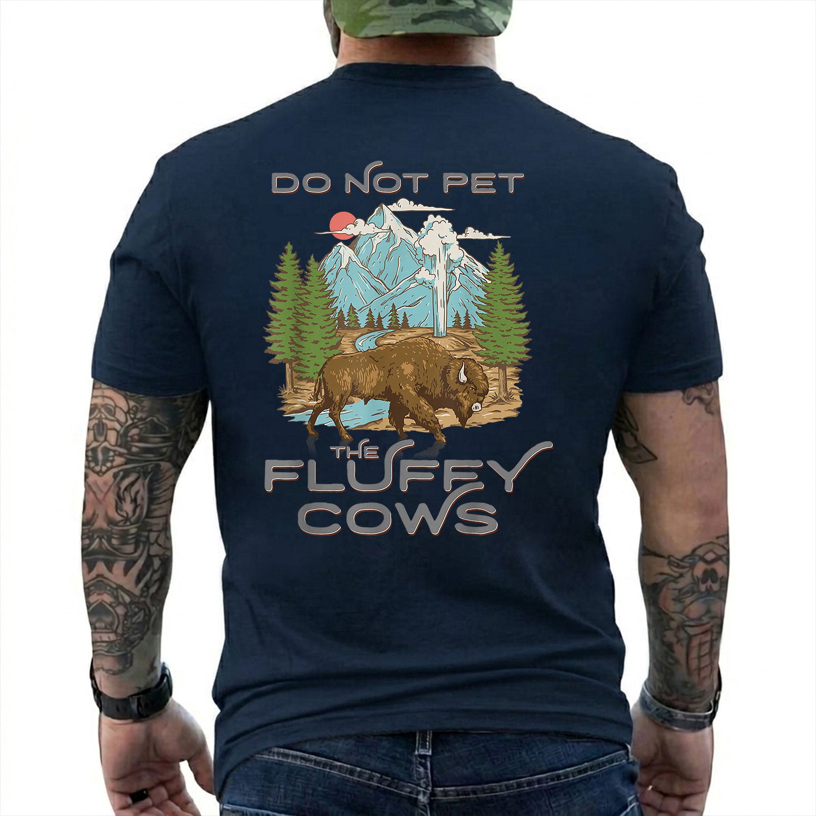 Navy T-shirt back with retro bison, mountain, forest, and geyser scene with Do Not Pet The Fluffy Cows text