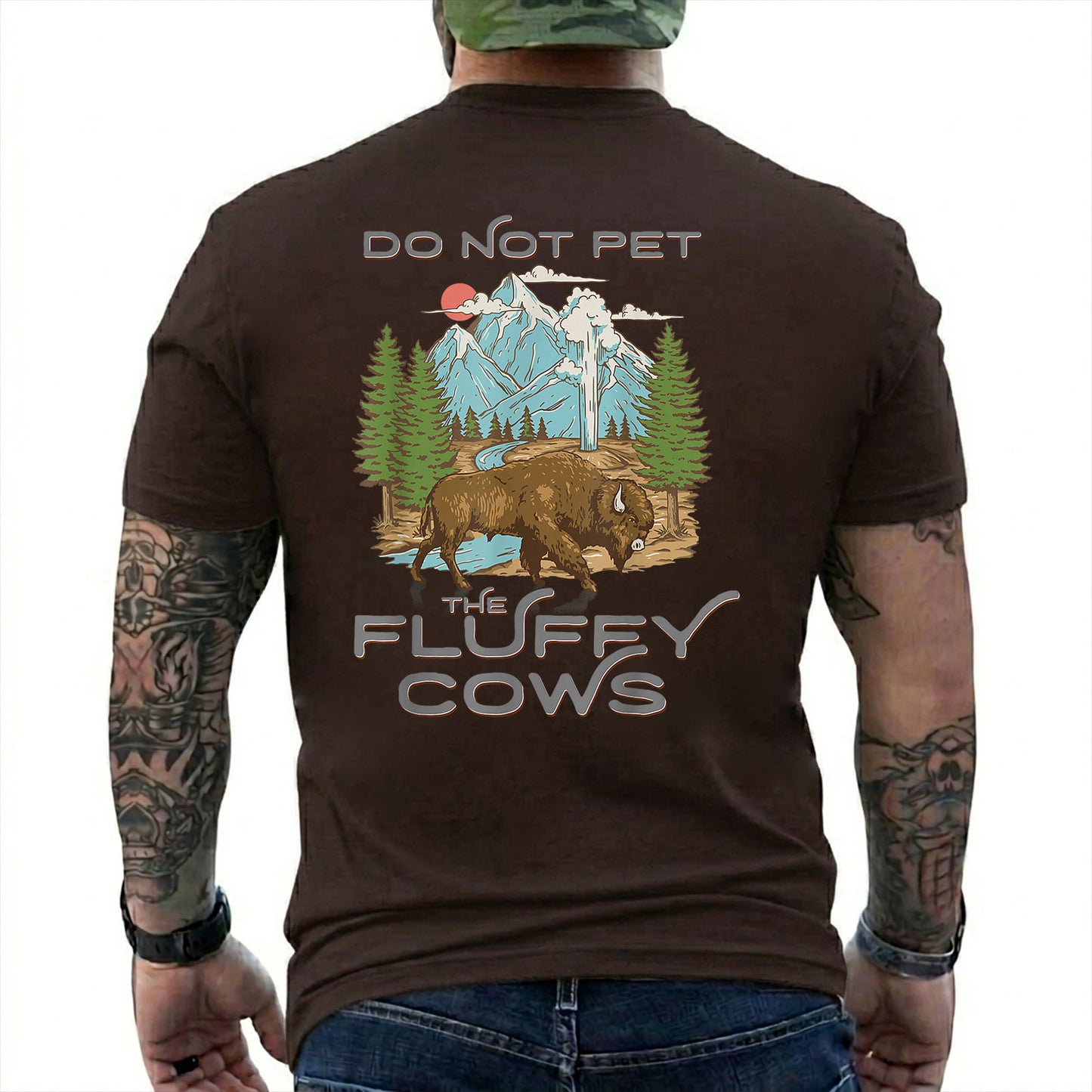 Dark Chocolate T-shirt back with retro bison, mountain, forest, and geyser scene with Do Not Pet The Fluffy Cows text