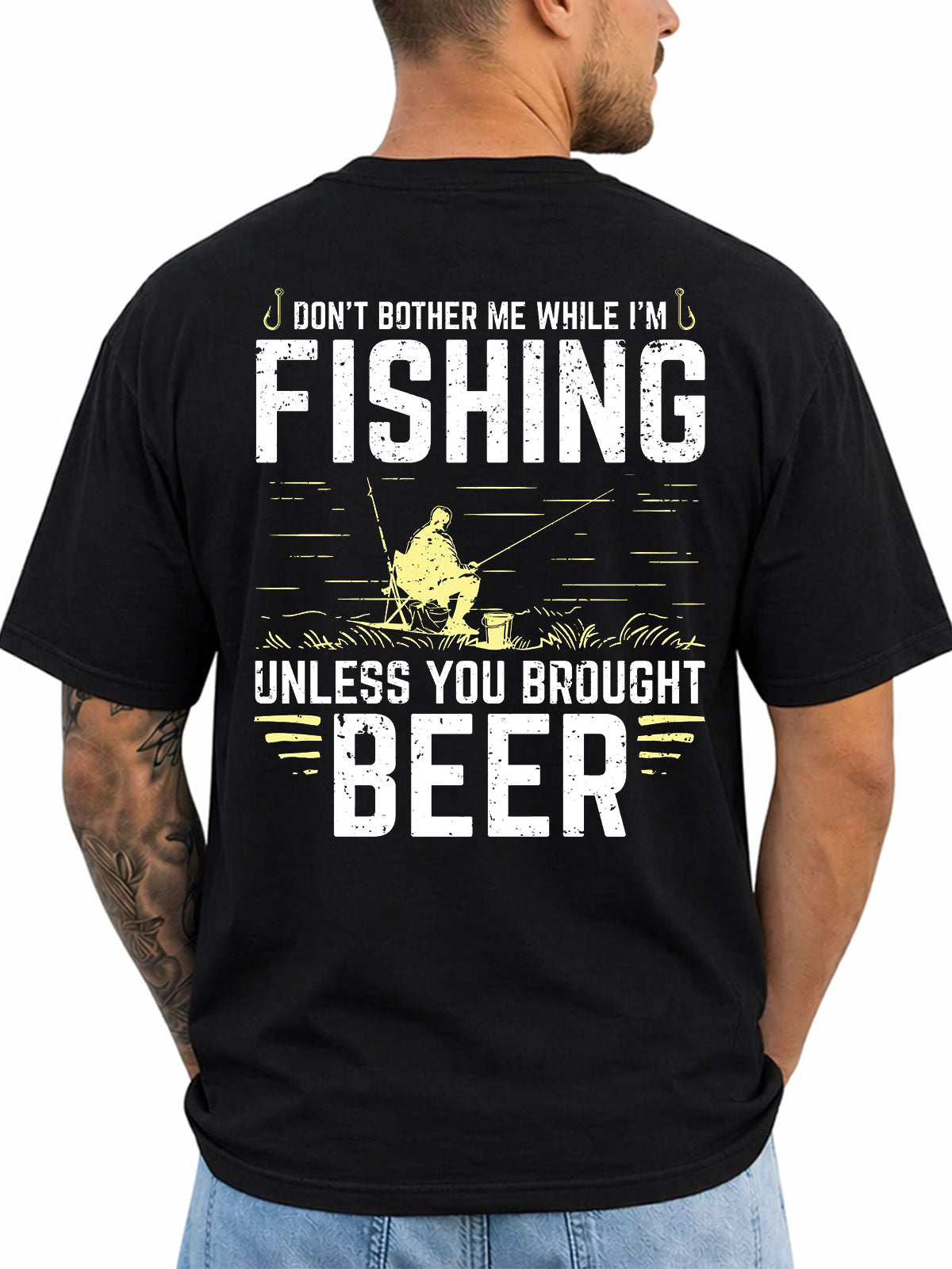 Black T-shirt back with angler graphic and 'Don't Bother Me While I'm Fishing Unless You Brought Beer' slogan