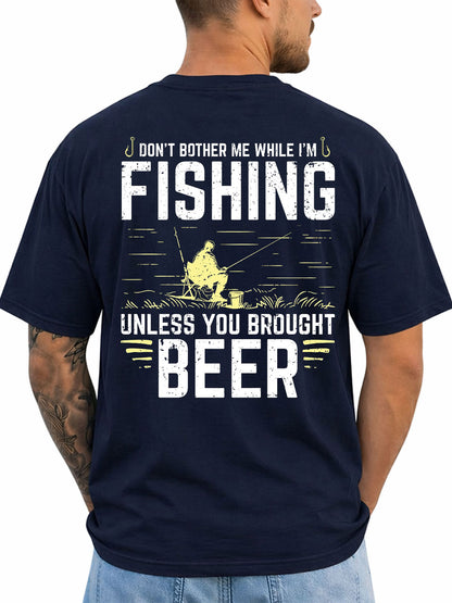Navy T-shirt back with seated fisherman and vintage slogan graphic