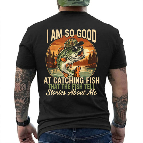 Black T-shirt back with jumping bass over a retro lake sunset and Fish Tell Stories back slogan reading 'I AM SO GOOD AT CATCHING FISH THAT THE FISH TELL STORIES ABOUT ME'