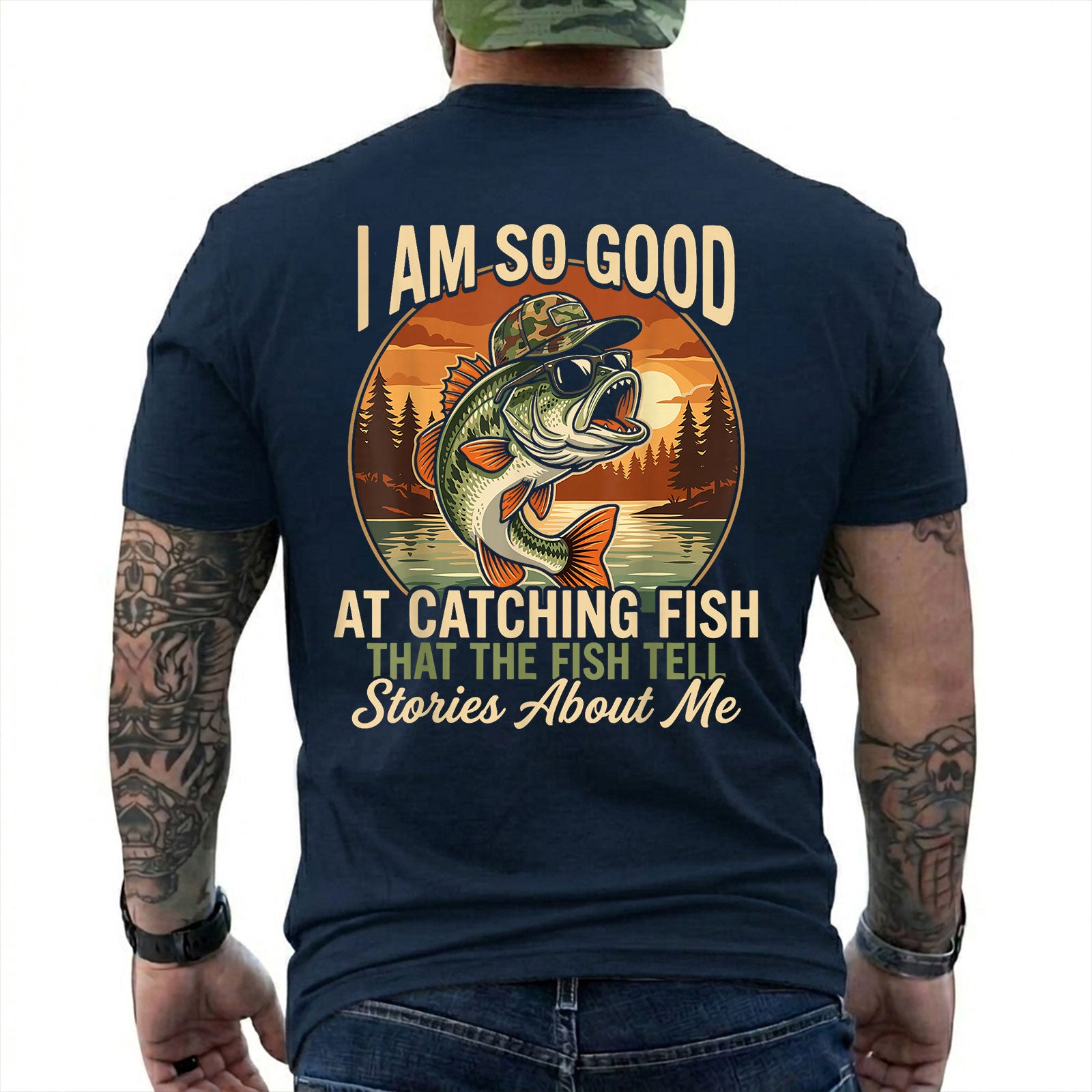 Forest Green T-shirt back with jumping bass over a retro lake sunset and Fish Tell Stories back slogan