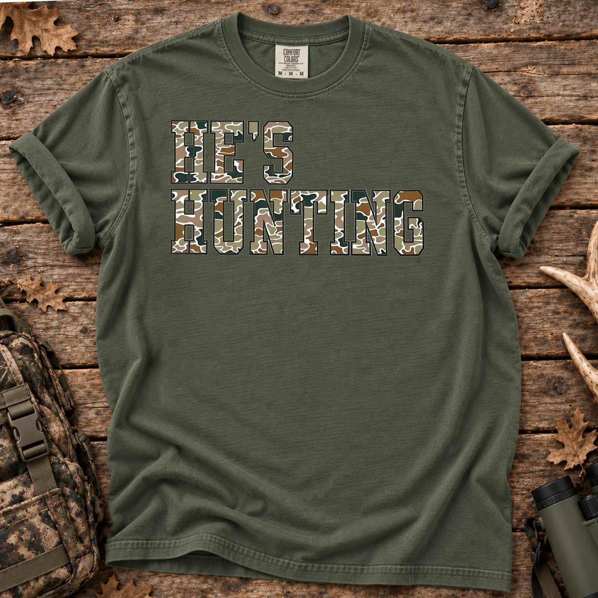 He's Hunting Camo Quote T-Shirt in Moss