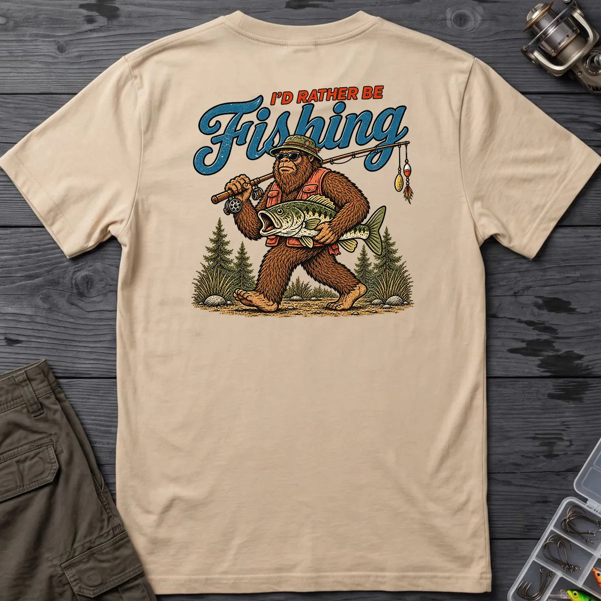 I'd Rather Be Fishing Bigfoot T-Shirt in Sand