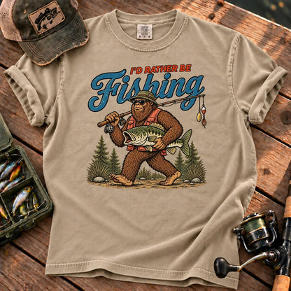 I'd Rather Be Fishing Bigfoot T-Shirt in Sandstone