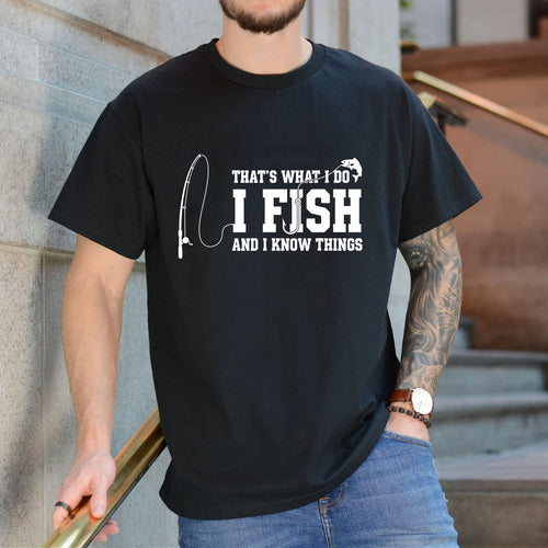 Black T-shirt front with fishing rod and I Fish and I Know Things front graphic reading 'THAT'S WHAT I DO I FISH AND I KNOW THINGS'
