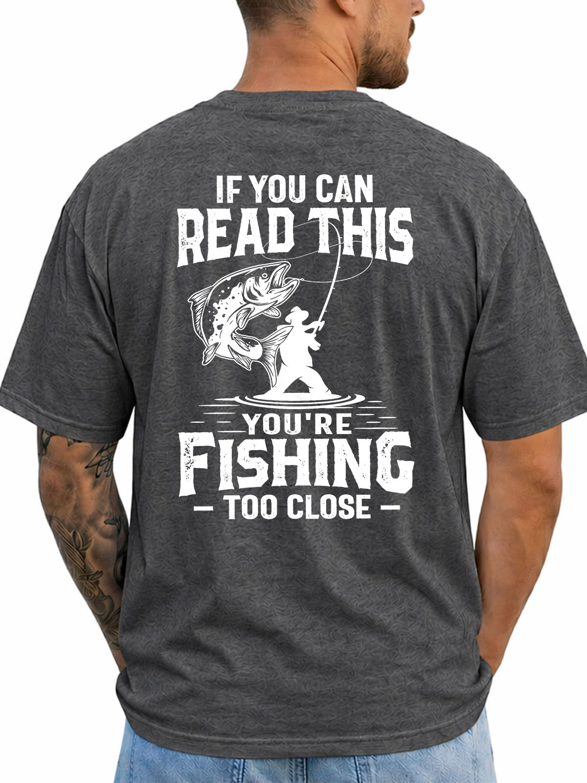 Dark Heather T-shirt back with distressed angler and leaping fish warning graphic