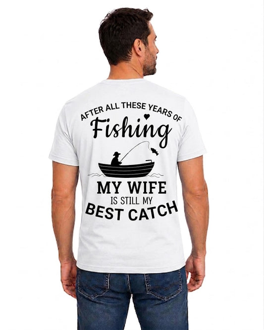 White T-shirt back with boat angler heart and My Wife Is Still My Best Catch message reading 'AFTER ALL THESE YEARS OF FISHING MY WIFE IS STILL MY BEST CATCH'