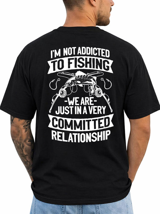 Black T-shirt back with fish, rods, hooks, and committed-relationship fishing joke reading 'I'M NOT ADDICTED TO FISHING WE ARE JUST IN A VERY COMMITTED RELATIONSHIP'