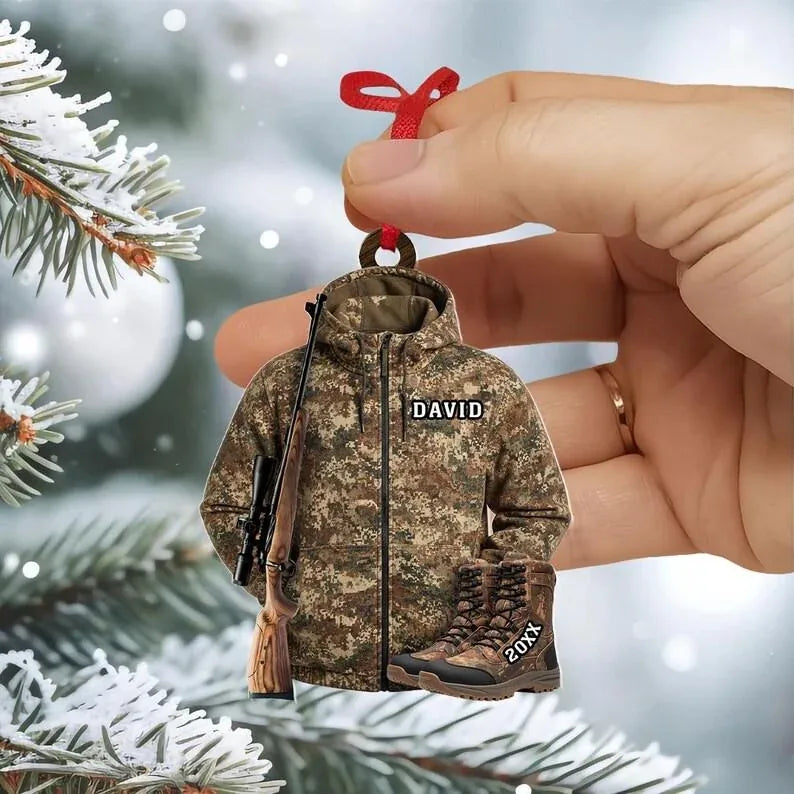 Close-up of a personalized camo hunter jacket ornament held by hand