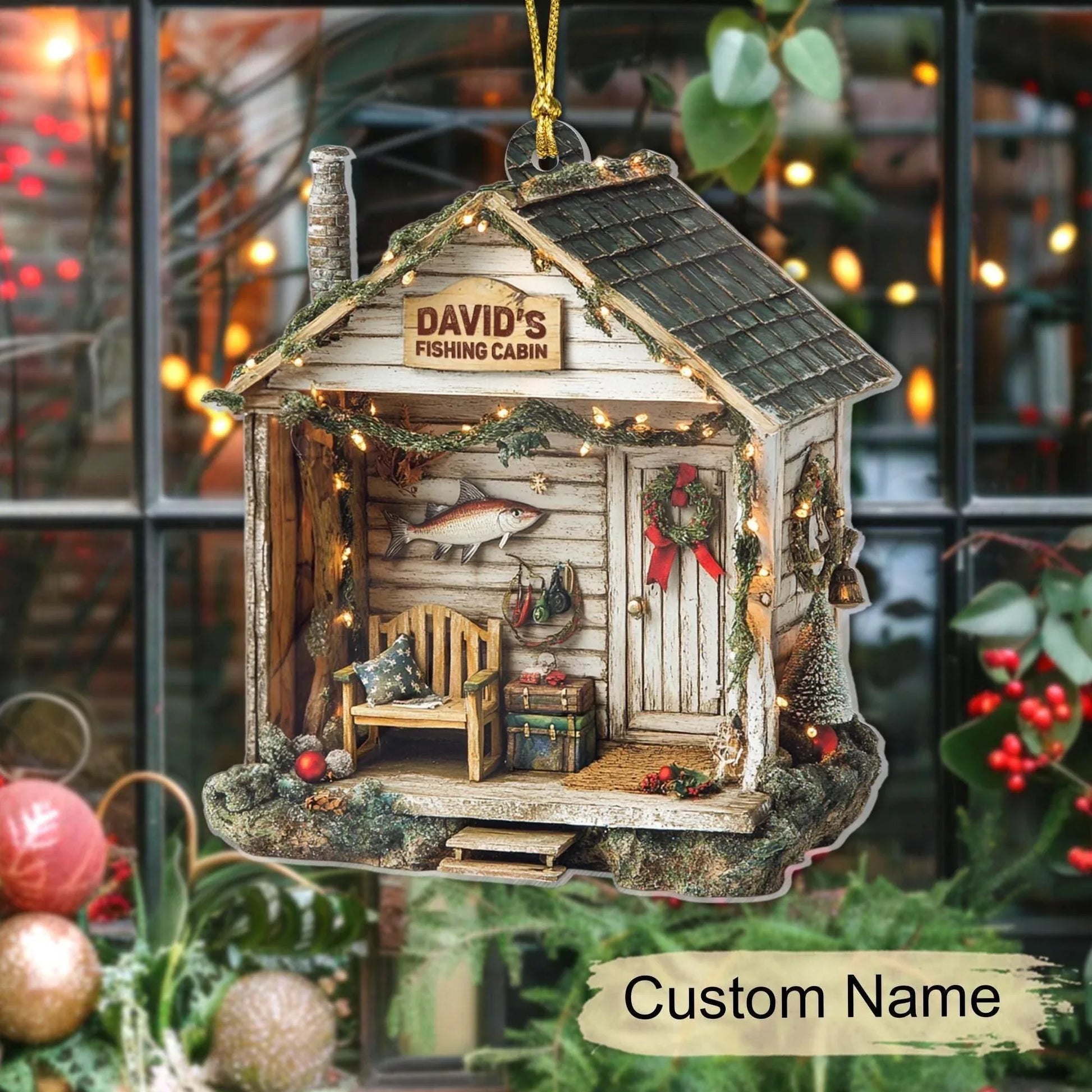 Personalized fishing cabin ornament showing custom name placement on the cabin sign