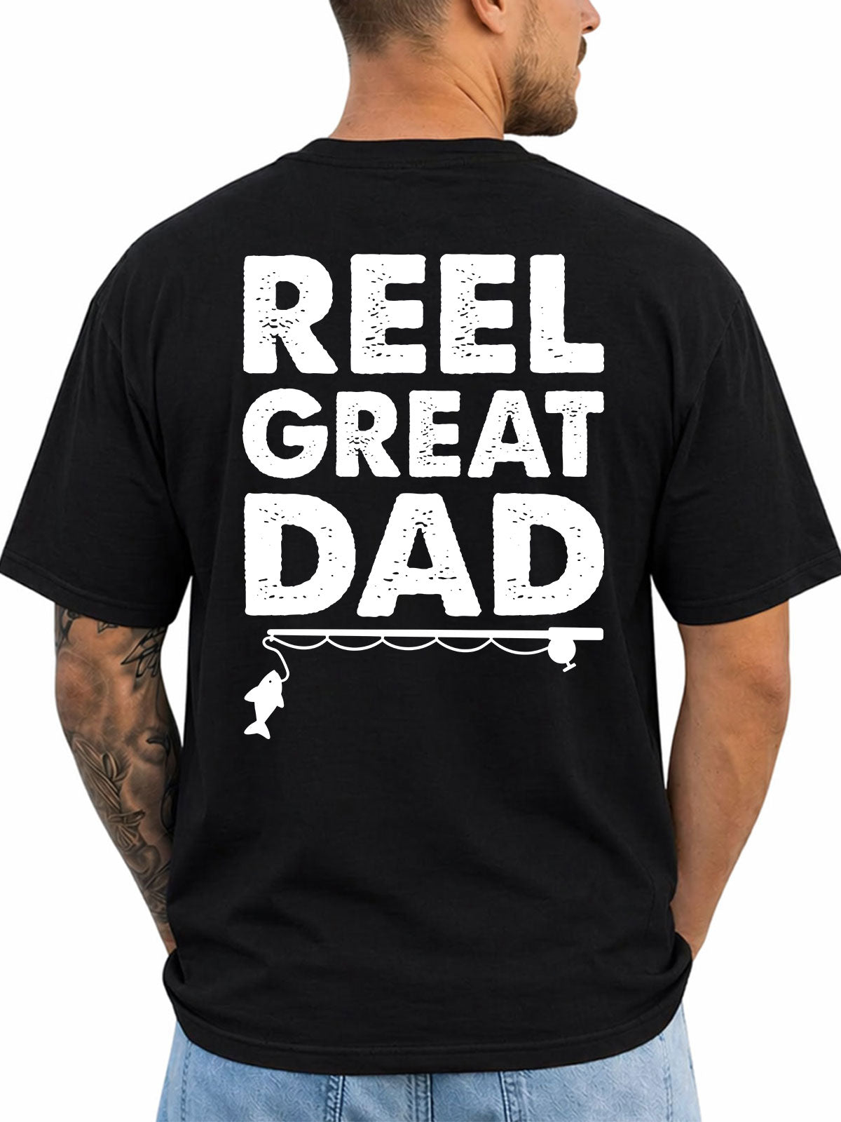 Black T-shirt back with bold Reel Great Dad text with rod and fish silhouette reading 'REEL GREAT DAD'