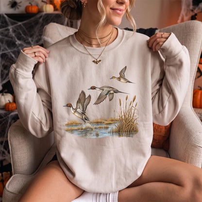 Retro Pintail Ducks in Flight Sweatshirt Women model in Sand