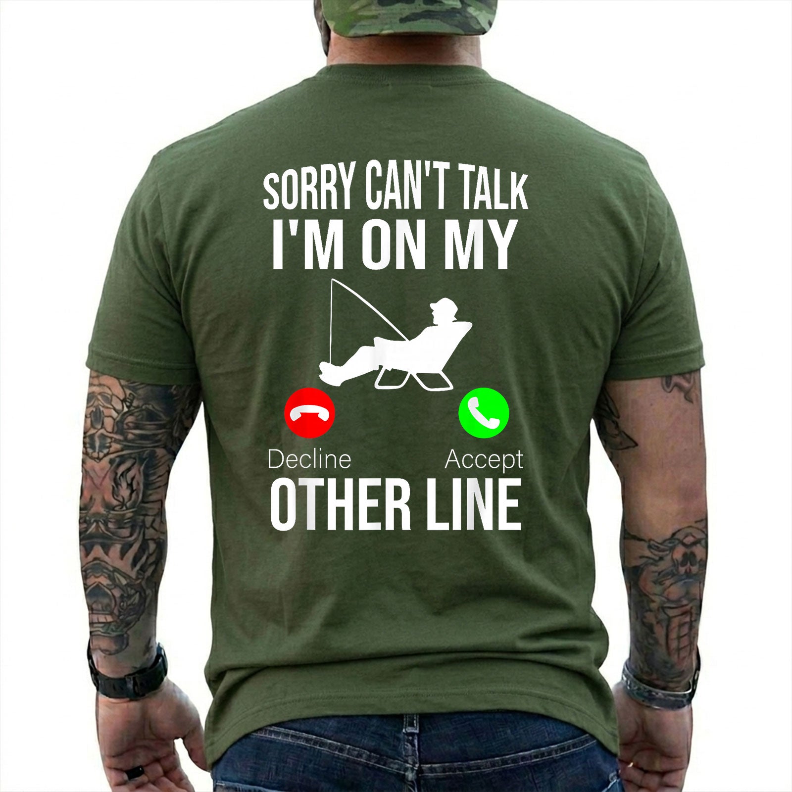 Military Green T-shirt back with seated angler, fishing line, and phone-call Other Line joke