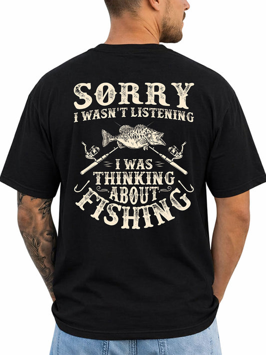 Black T-shirt back with distressed fish, crossed rods, and thinking-about-fishing quote reading 'SORRY I WASN'T LISTENING I WAS THINKING ABOUT FISHING'