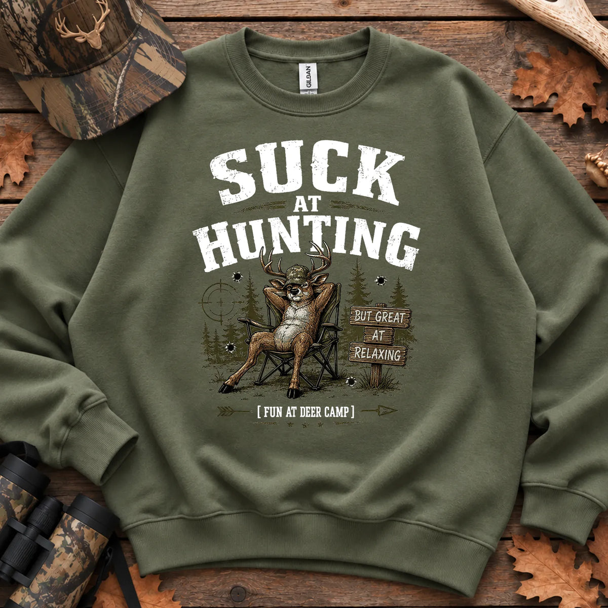 Suck at Hunting Deer Camp Sweatshirt in Military Green