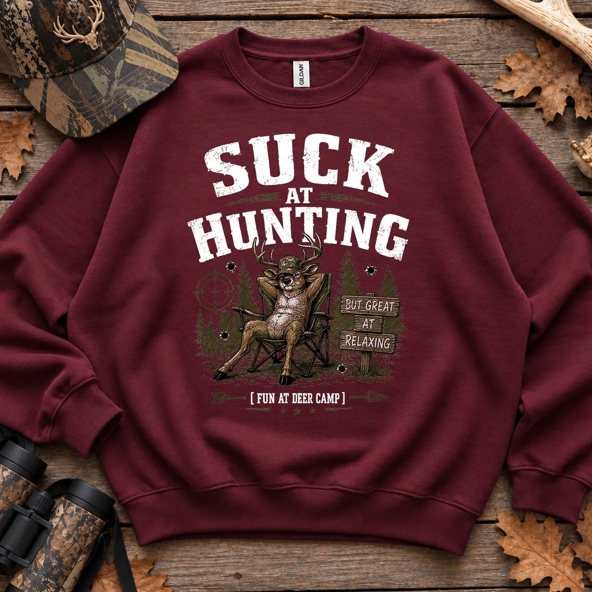 Suck at Hunting Deer Camp Sweatshirt in Maroon