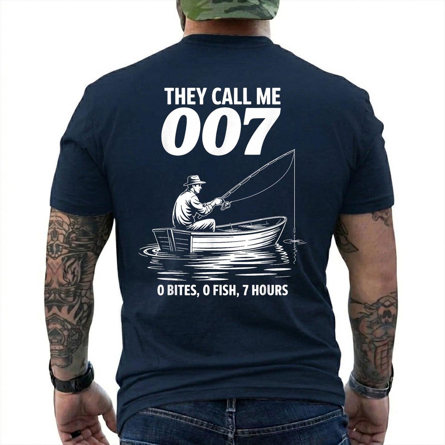 Forest Green T-shirt back with angler in a small boat and 0 bites 0 fish 7 hours joke