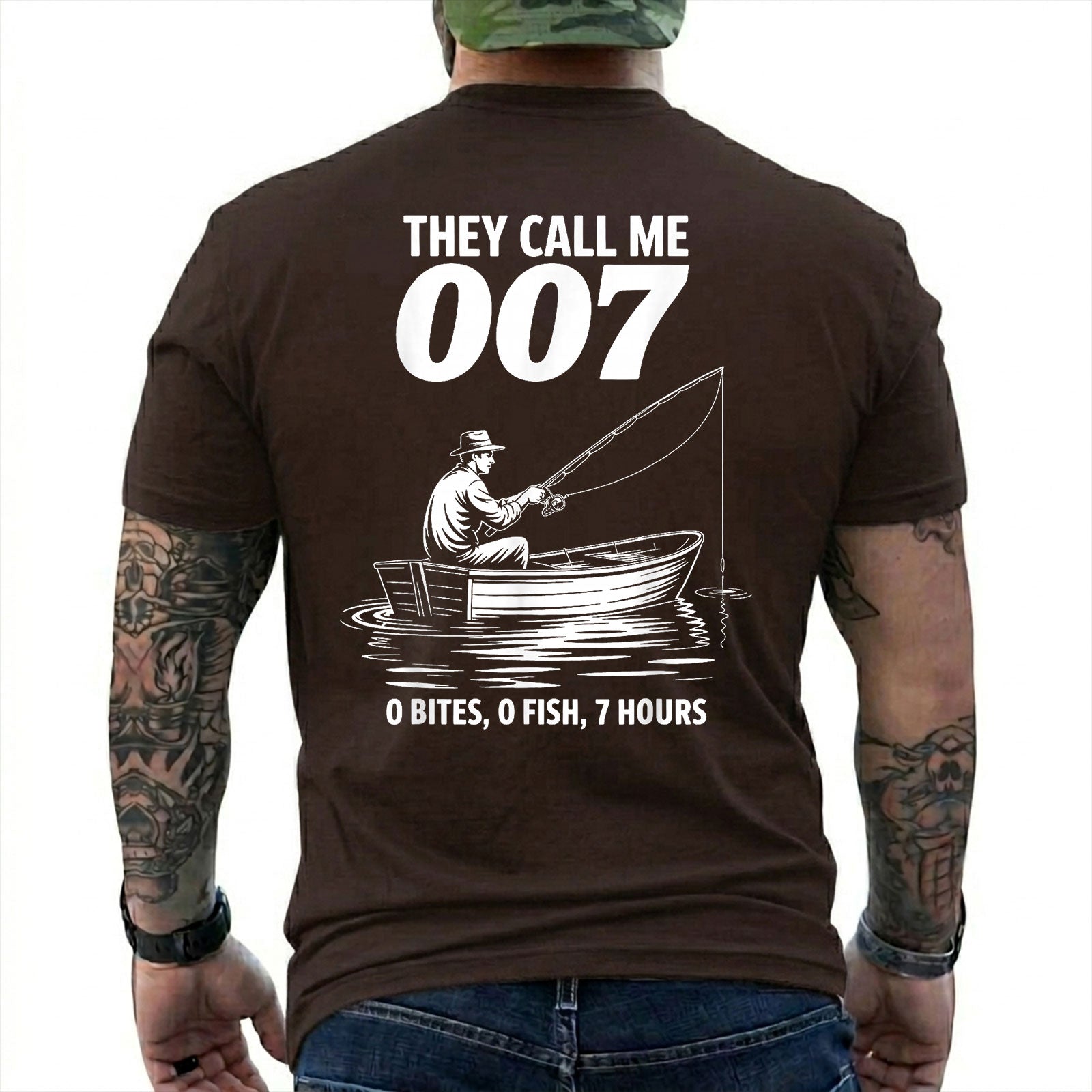Dark Chocolate T-shirt back with angler in a small boat and 0 bites 0 fish 7 hours joke
