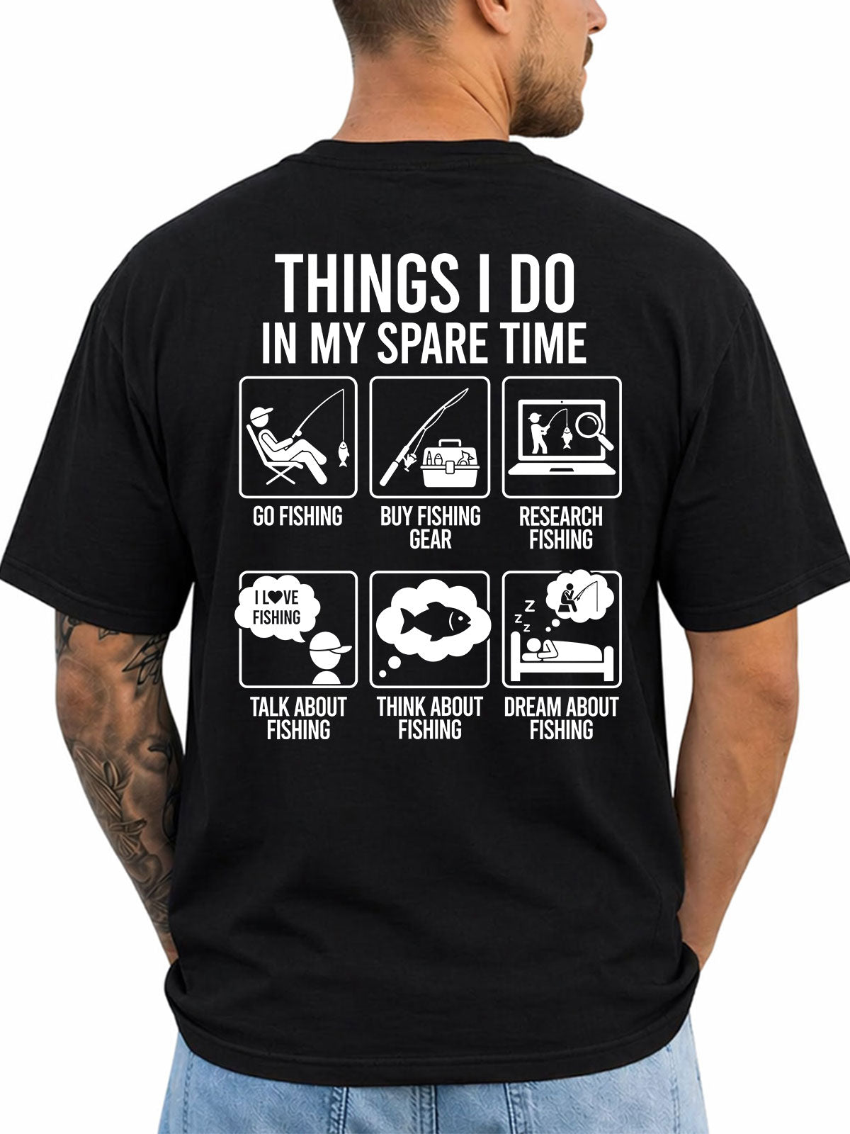 Black T-shirt back with six-panel spare-time fishing activities infographic reading 'THINGS I DO IN MY SPARE TIME: GO FISHING, BUY FISHING GEAR, RESEARCH FISHING, TALK ABOUT FISHING, THINK ABOUT FISHING, DREAM ABOUT FISHING'