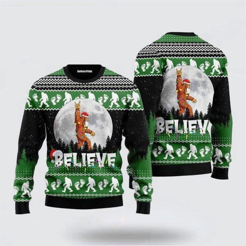Front and back of a green and black sweater with Bigfoot in a Santa suit and the word Believe