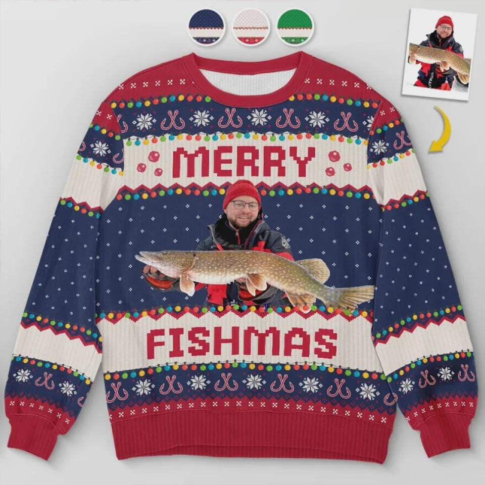 Navy Merry Fishmas sweater with a photo of an angler in a red beanie holding a pike
