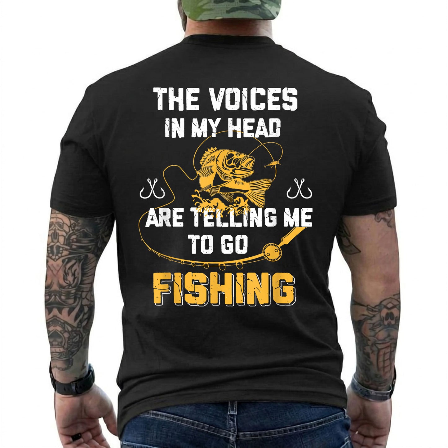 Black T-shirt back with gold bass and Voices in My Head go fishing back slogan reading 'THE VOICES IN MY HEAD ARE TELLING ME TO GO FISHING'