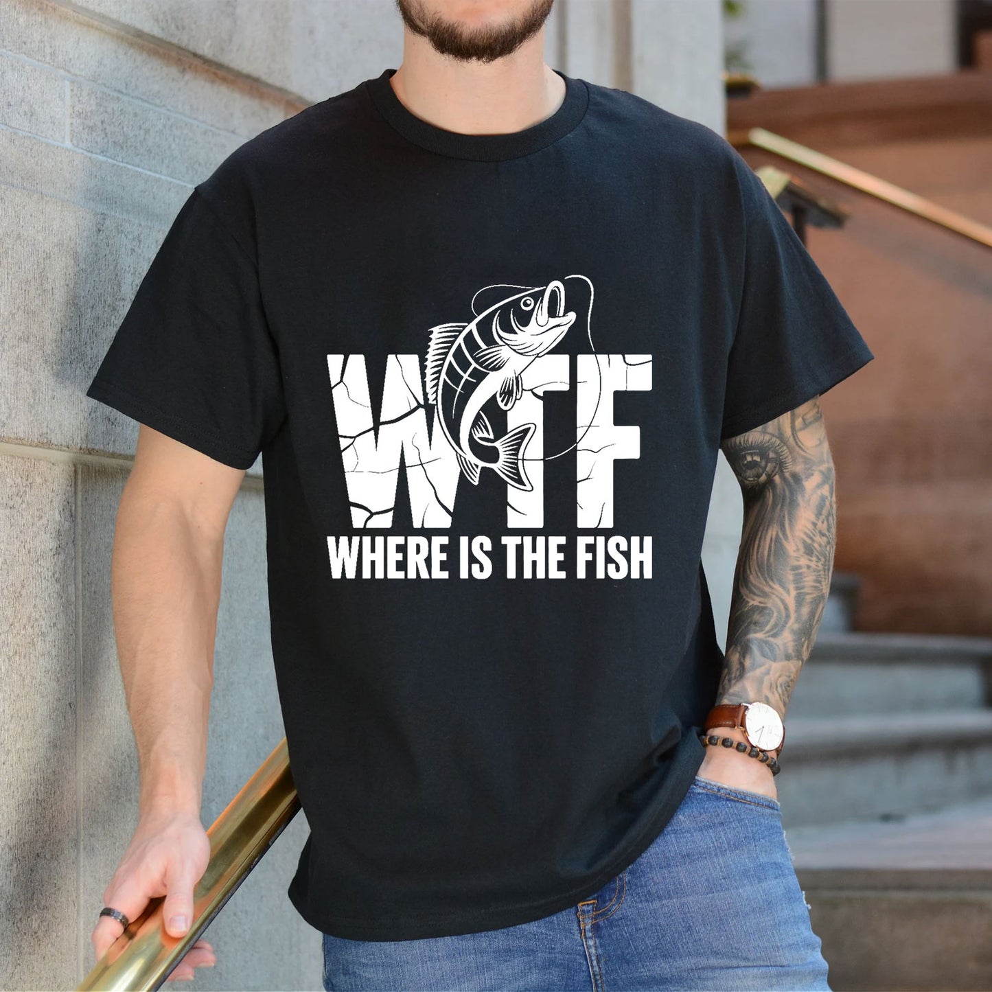 Black T-shirt front with cracked WTF lettering with a jumping fish and Where Is the Fish caption reading 'WTF WHERE IS THE FISH'