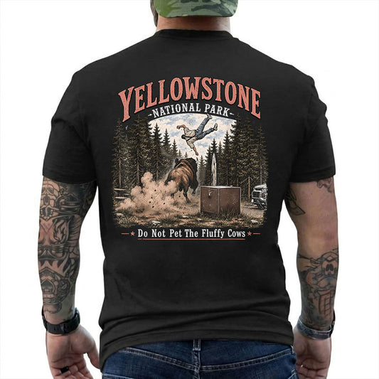 Yellowstone Bison Tossing Tourist T-Shirt artwork detail with Yellowstone bison tossing a tourist beside Do Not Pet The Fluffy Cows text reading 'YELLOWSTONE NATIONAL PARK DO NOT PET THE FLUFFY COWS'