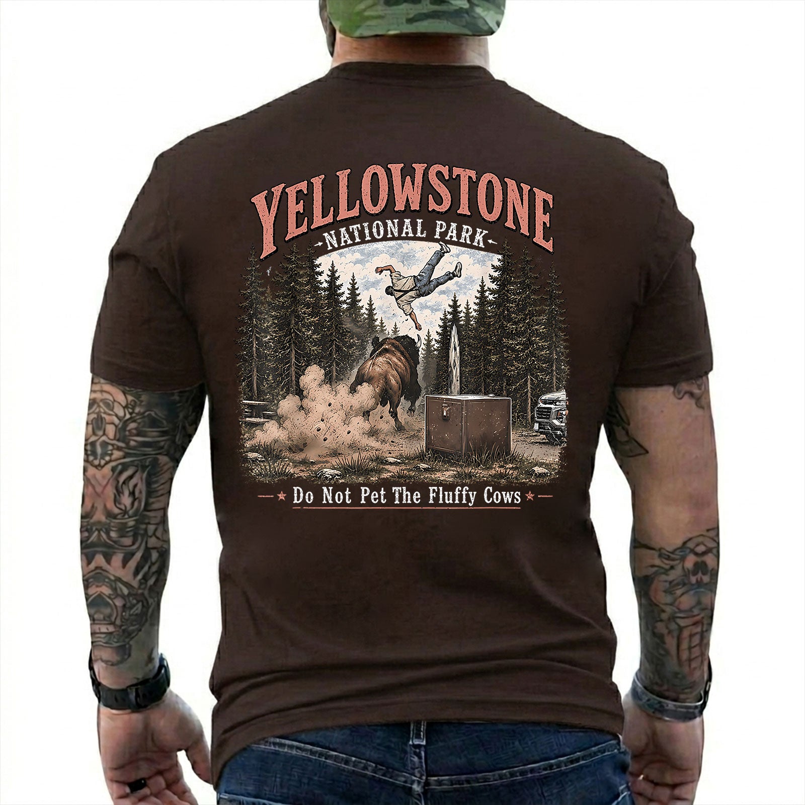 Dark Chocolate T-shirt back with Yellowstone bison tossing a tourist beside Do Not Pet The Fluffy Cows text
