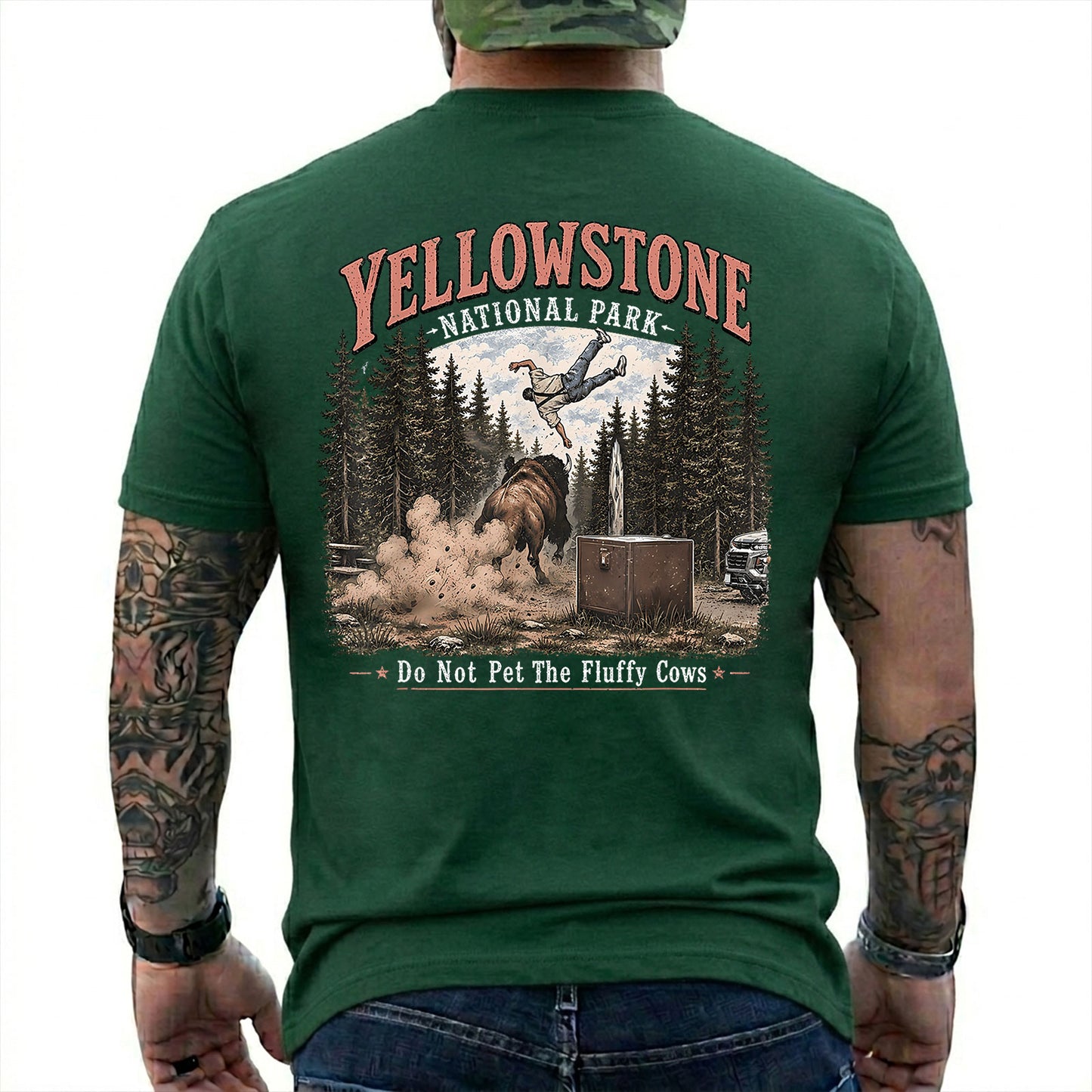 Forest Green T-shirt back with Yellowstone bison tossing a tourist beside Do Not Pet The Fluffy Cows text